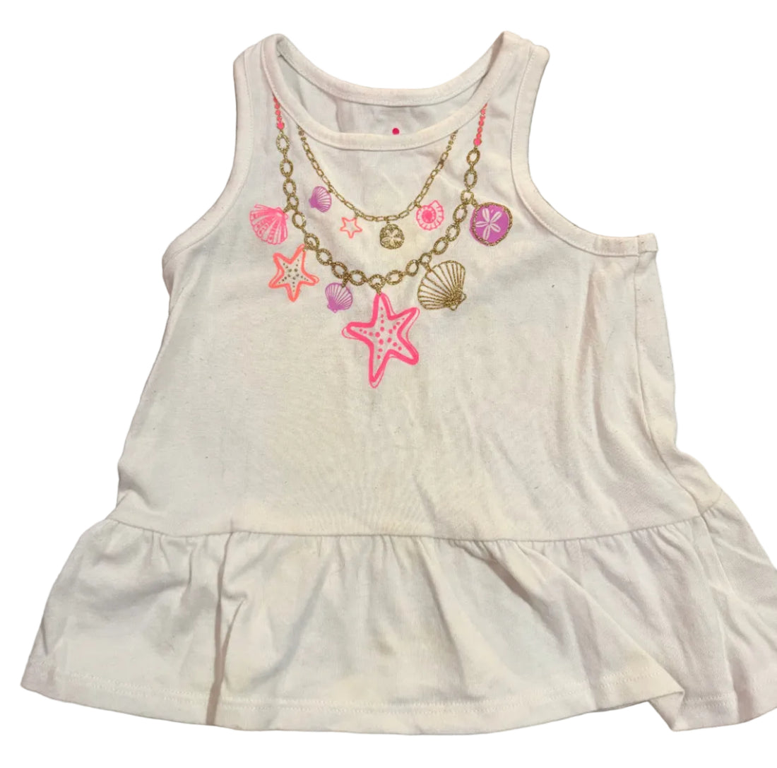 White sleeveless top with colorful seashells